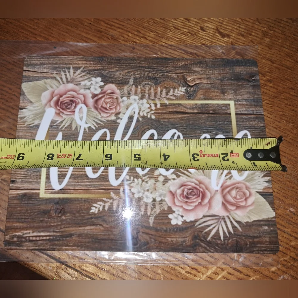 Rustic Welcome Sign with Pink Roses.